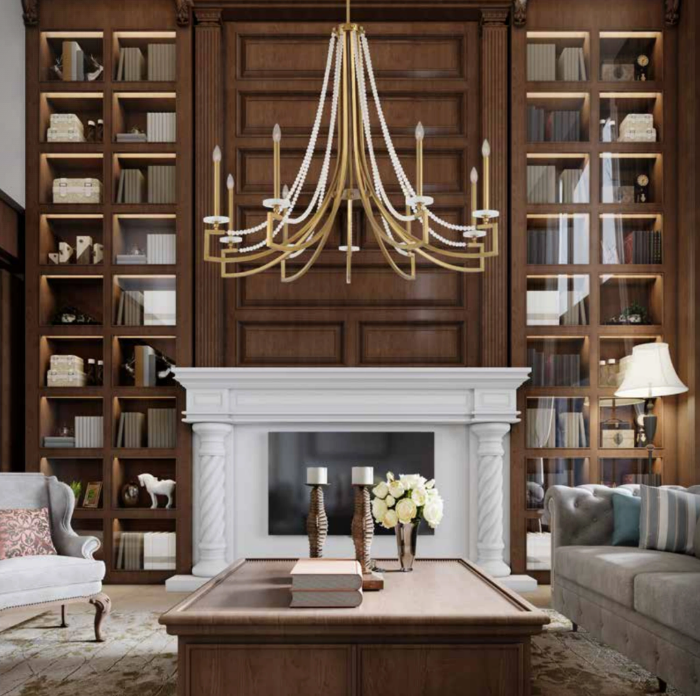 Gold beaded chandelier coordinating with dark wood built-ins and white fireplace mantel